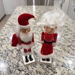 set of two wooden Mr. and Mrs. Santa Claus nutcrackers.